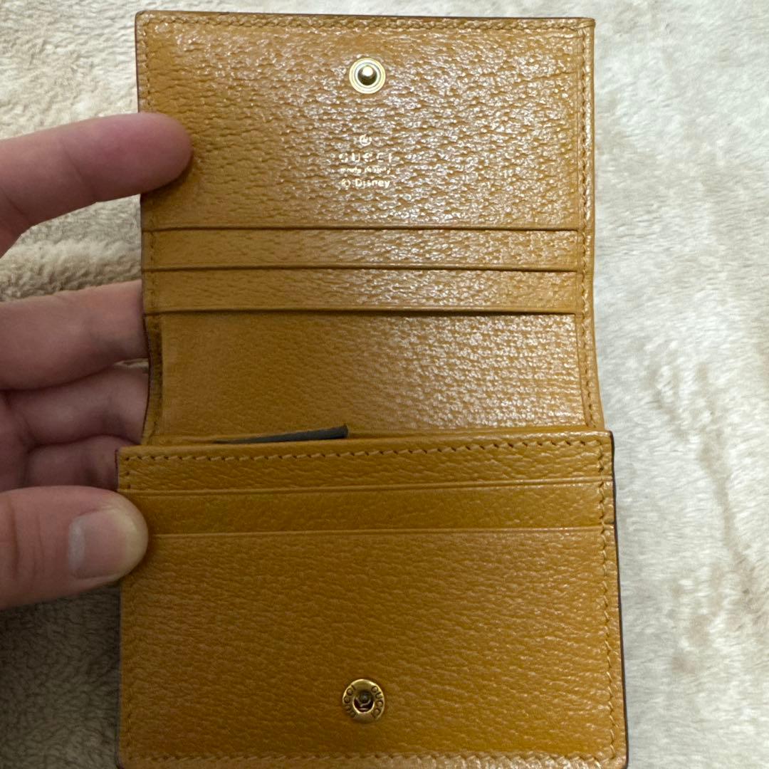 美品】GUCCI ミッキーマウス 二つ折り財布 - メルカリ