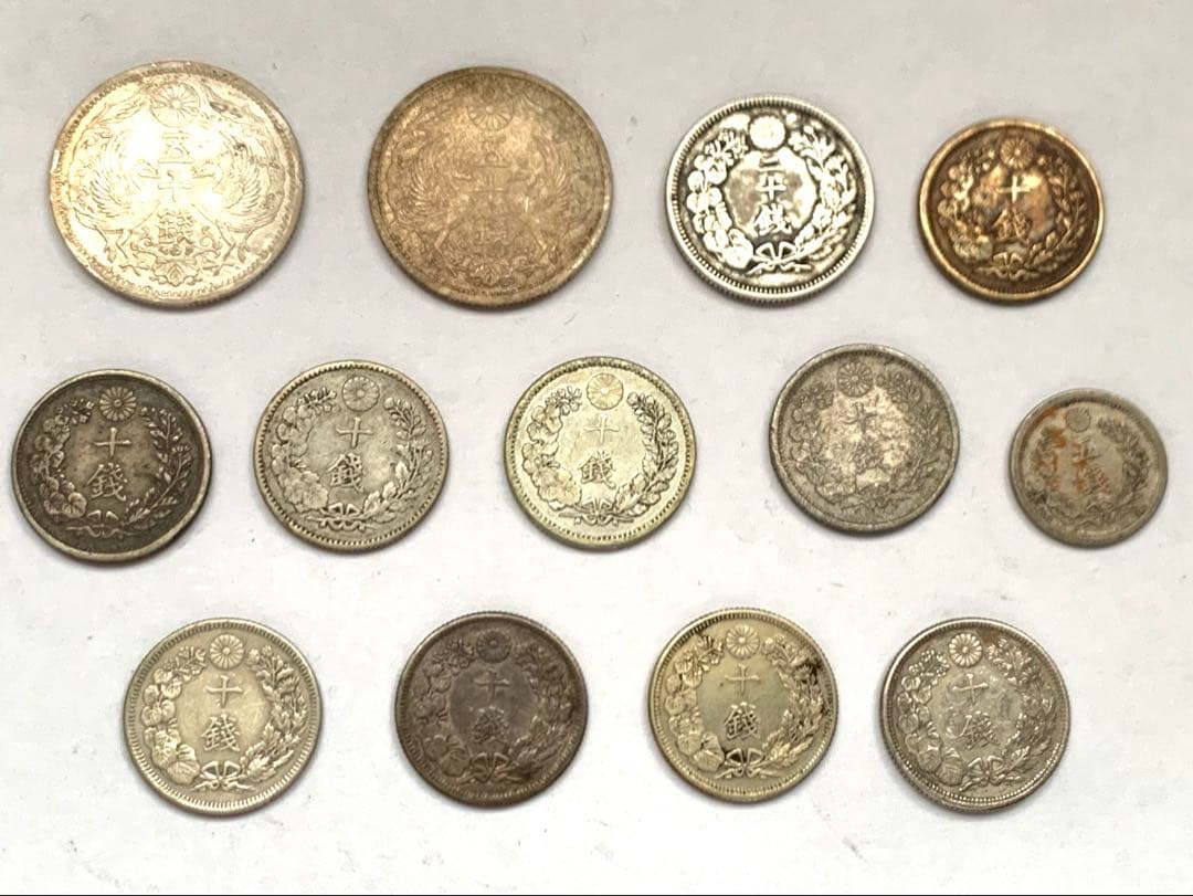 古銭　近代銀貨まとめ　13枚　50銭 20銭 10銭 5銭　竜　旭日　大日本 旭日竜大型50銭銀貨の買取相場紹介！偽物の見分け方やその他の旭日竜