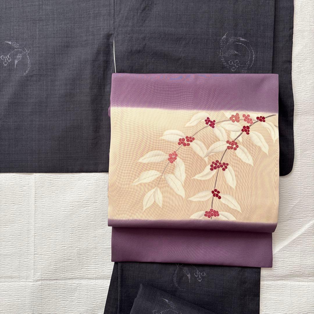 ⭐️九寸名古屋帯 ⭐️紫色　塩瀬帯　はんなり　お太鼓柄　金彩　染め帯　植物柄 中古 名古屋帯 正絹 法事用 紫地に蓮模様 塩瀬 九寸 お太鼓柄